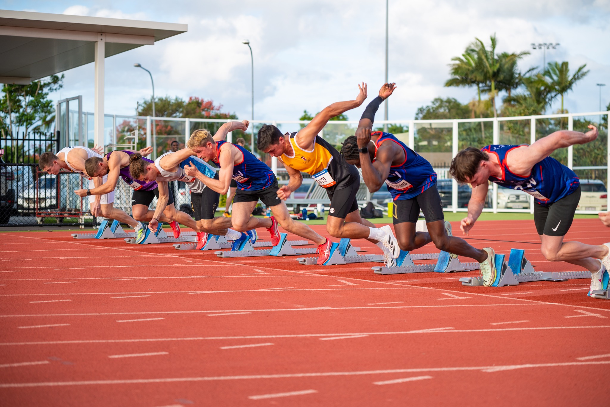 Men's 100m heats start line taking off