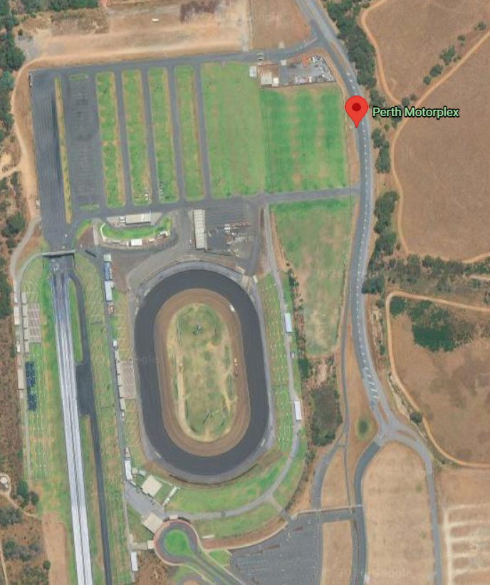 Aerial view of Perth Motorplex showing a large oval race track, infield and surrounding roads and parking areas.